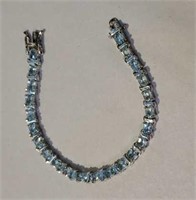 Sterling silver bracelet with blue stones that