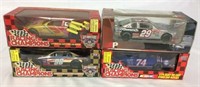 4 Die cast collector cars