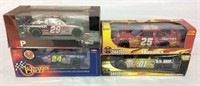 4 die cast collector cars