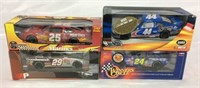 4 die cast collector cars