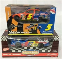 2 die cast collector cars