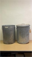 Two metal trash cans
