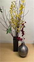 Vases with artificial flowers