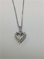 14k white gold Diamond heart pendant on a 14k