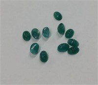 11pc matching carved oval Emeralds 5.11 cttw