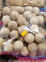 Bag of wooden balls approximately the size of a