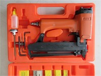 An Airy ATK-0241 Nail Gun With Assorted Nails