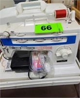 TAYLOR PORTABLE SEWING MACHINE W/ CARRY CASE