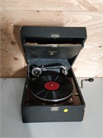 1920's portable wind up victrola with records