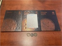 Three Lincoln cents books and half cents