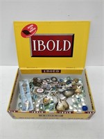 cigar box with marbles and souvenir spoons
