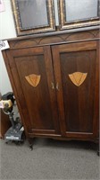 ANTIQUE WARDROBE ON CASTERS, SHELVES HAVE BEEN