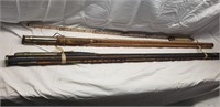 2 wooden fishing rods in their wooden carry case