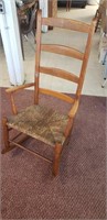 rush seat high back armed rocking chair