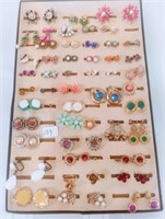 many pairs of earrings