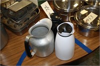 1 steel water pitcher and 2 carafes