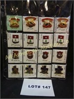 Sixteen military pins
