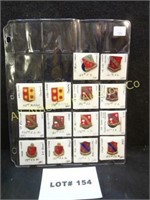Fourteen military pins