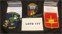 Three military patches