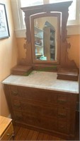 Antique white marble top dresser with three