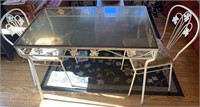 White metal patio table with two matching chairs,