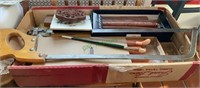 Box lot - meat saw, candles, artist paint brush,