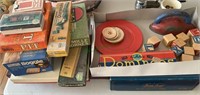 Vintage game collection including dominoes, Pit,