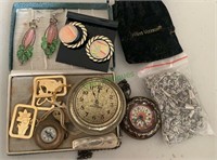 Two toy pocket watches, one compass, bookmarks,