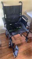 Black collapsible wheelchair - great for getting