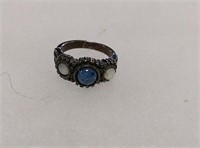 Sterling silver ring with blue gem and 2 white