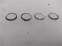 4 rings from left to right size: 7.5 , 8.25, 8,
