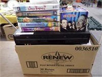 DVD/VHS Player and Box of VHS Tapes