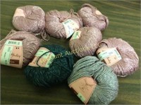 assorted skeins yarn pinks