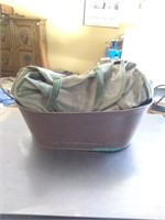 Metal tub with 2 canvas bags used for firewood