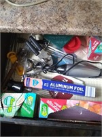 Kitchen drawer contents- mixer, unopened foil,