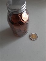 About 2 Pounds of Pennies in a jar