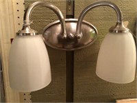2 glass globes, wall mount brushed nickle