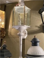 White metal, clear glass outdoor wall mount light