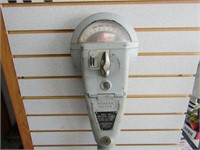 Vintage Duncan parking meter on post.