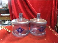 (2) Ice mountain water jugs. Plastic.