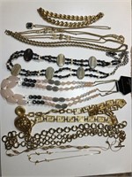 10 pieces costume jewelry 8 necklace and 2 gold