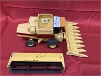 Die cast toy New Holland combine with unmatched