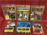 6 Batman action figures in original packaging.