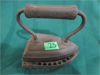 Sad iron with cast iron handle