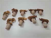9 pc carved rhino & Elephant bottle stoppers