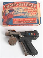 SUPER DEFENSE PAPER BUSTER GUN w/ BOX