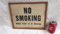 No smoking while court is in session sign