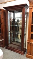 Modern curio cabinet with side doors and beveled