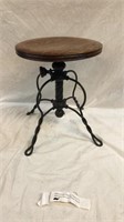 Antique piano stool with oak top and wrought iron