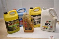 Full Jug of 5w30 Oil and part jugs of antifreeze